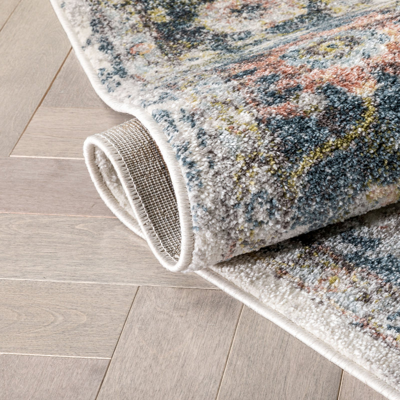 Ivory and Blue Synthetic Oriental Area Rug 5'3" x 7'3"