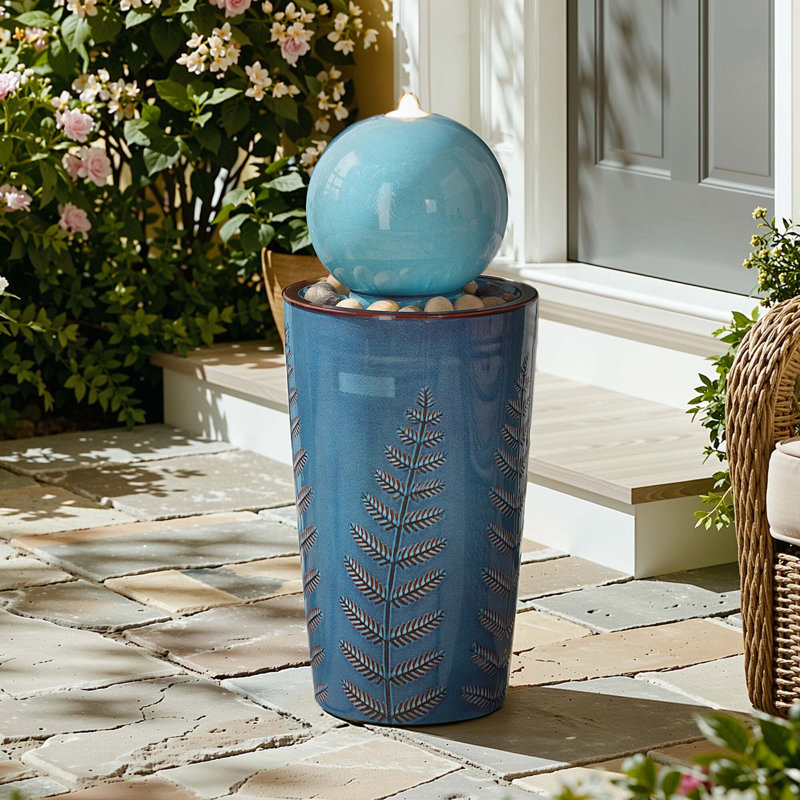 29.5" Ceramic Outdoor Water Fountain with LED Lights, Trickling Waterfall & Nature-Inspired Sphere with Leaf Patterns and Decorative Pebbles in Teal Blue Glaze for Patio Yard Garden
