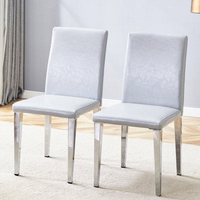 Deux chaises de salle à manger en polyuréthane gris clair (seulement les chaises)