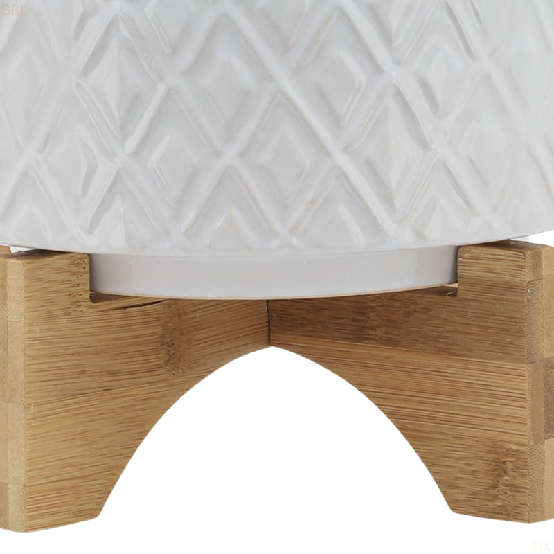 POT DE FLEURS SUR UN SUPPORT EN BOIS