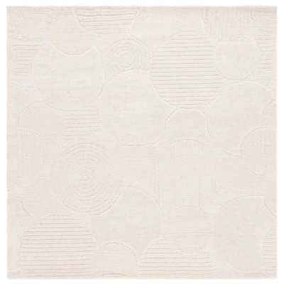 Tapis ivoire en laine / coton touffeté à la main Maryorie