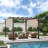 12 pi. L 10 pi. D Pergola en acier avec auvent