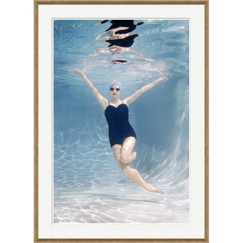 Caucasian Woman Swimming Underwater Framed