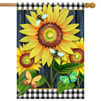 Drapeau de maison de tournesols en fleurs