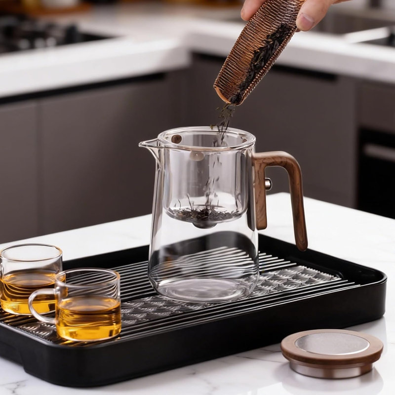 Théière Enchanted, théière magique pour infuseur à feuilles mobiles, théière en verre borosilicaté résistante à la chaleur avec infuseur de thé, cadeau idéal pour les amateurs de thé