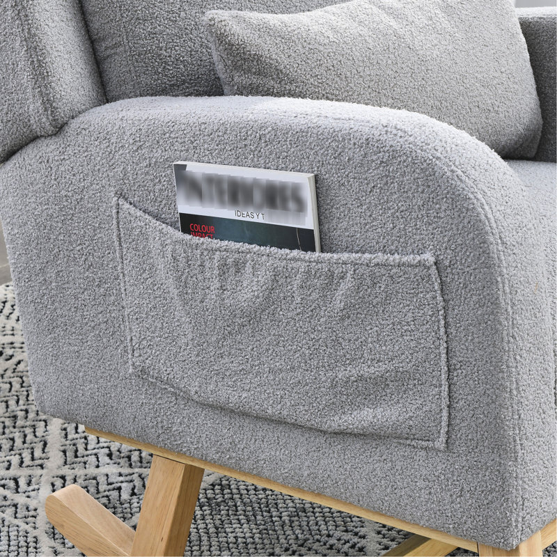 Fauteuil à bascule moderne gris avec soutien lombaire supplémentaire et poches latérales avec revêtement deux