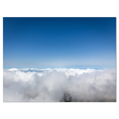 «Vue aérienne du ciel au-dessus des nuages», reproduction de photo sur toile tendue encadrée
