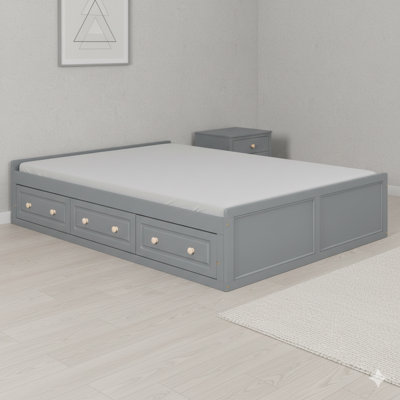 Gray Wooden Queen-Sized Platform Bed Structure Incorporating Six Built-In Storage Drawers.