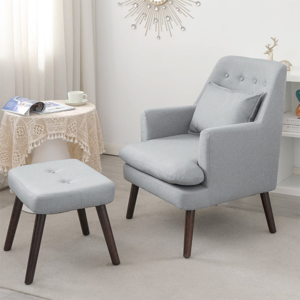 Grey armchair and online footstool