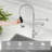 The Kitchen Faucet Features A Pull-Down Sprayer, Stainless Steel Single Handle, And A Spring Kitchen Faucet With A Sprayer.-113399783