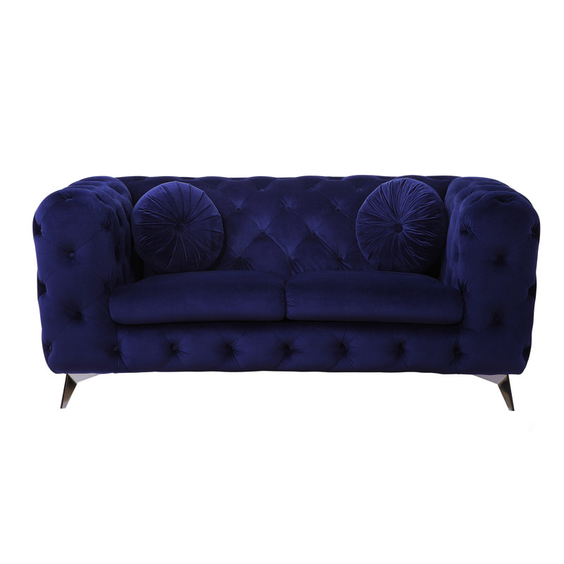 Causeuse en velours bleu