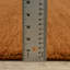 Tapis en laine rouille unie Makhari-1003433167