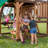 Backyard Discovery Highlander Cedar Wood Swing Set with Wave Slide, Three-Story Clubhouse, Rock Wall, and Picnic Table