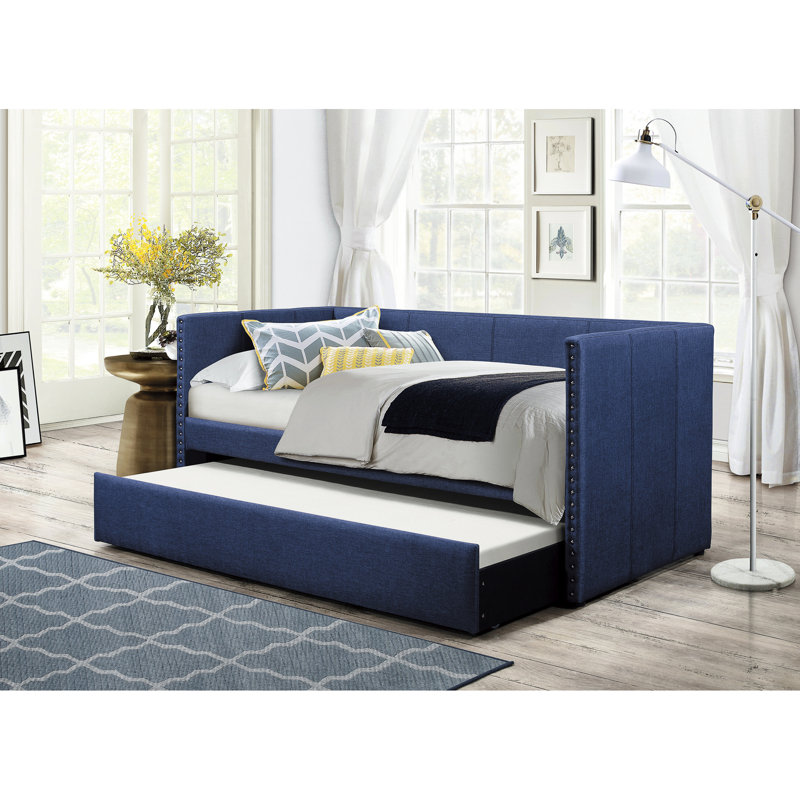 Lit de jour bleu en tissu avec structure en bois et lit gigogne escamotable pour le soutien de la maison