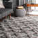 Tapis gris à motif géométrique Fresquez