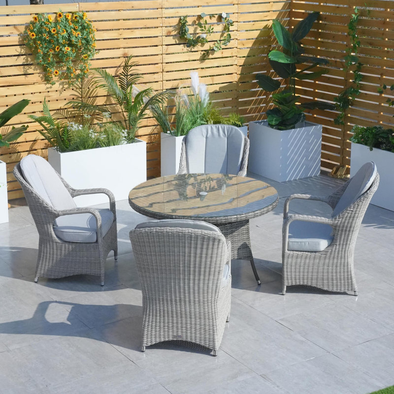 4 - Person Wicker Patio Dining Set with Round Table , Cushions Included