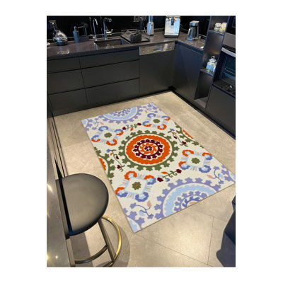 Tapis crème lavable à la machine