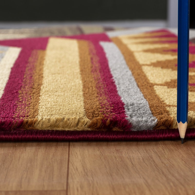 Tapis Lodge de 2 pi x 3 pi en polypropylène rouge et polypropylène accentuant les taches
