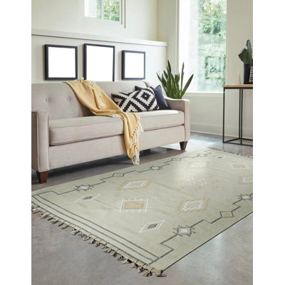 Tapis contemporain ivoire en laine noué à la main