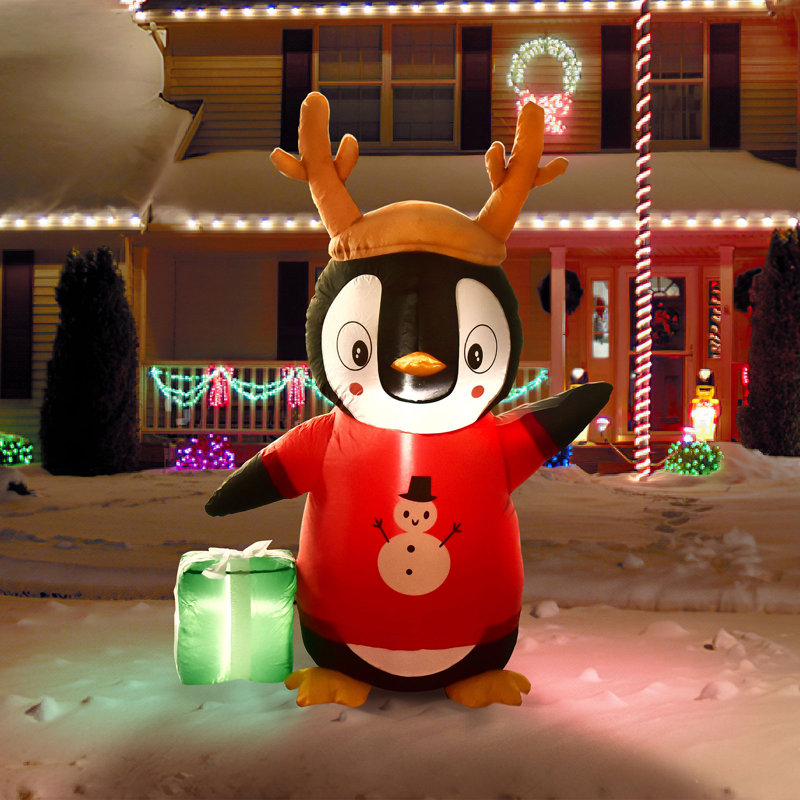 Pingouin cadeau avec sac de renne gonflable