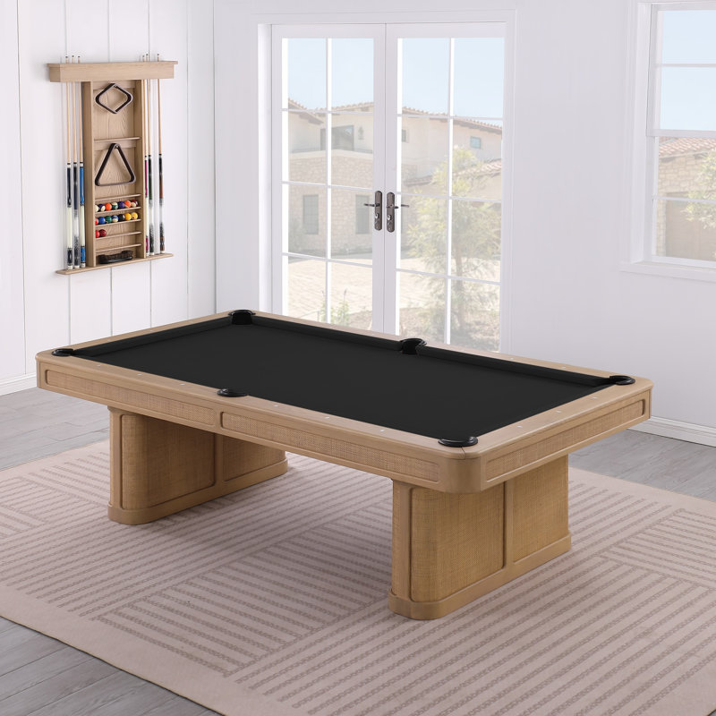 Pool table with a light wood frame, black felt, and bamboo veneer accents featuring pedestal legs.