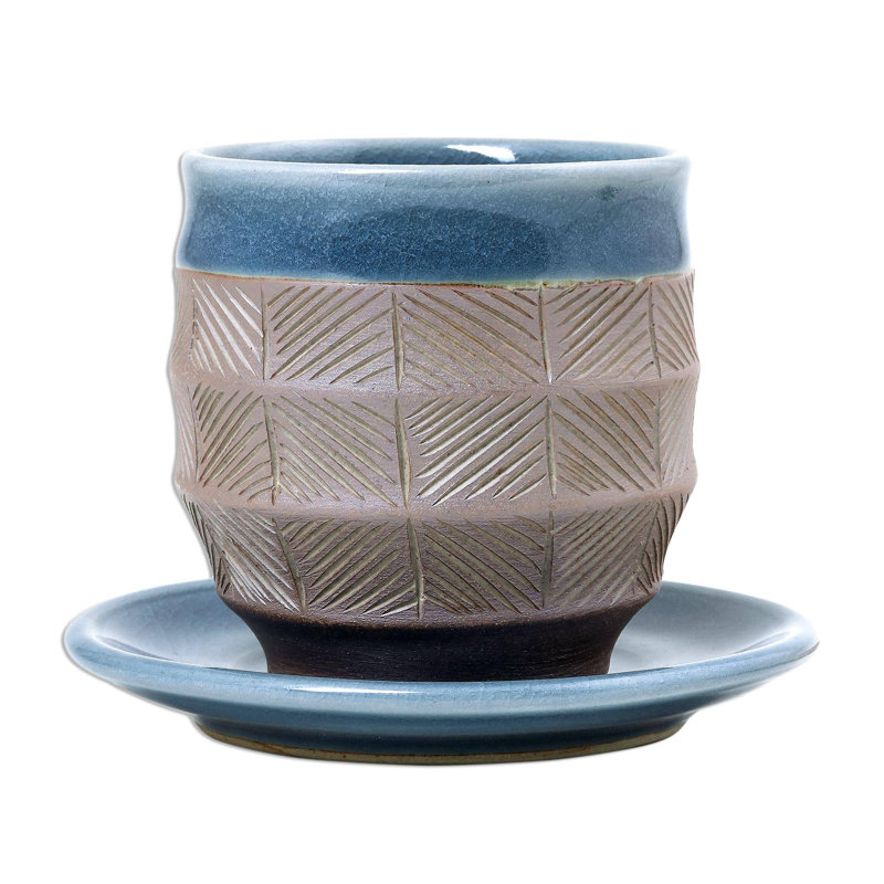 Ceramic Teacup and Saucer