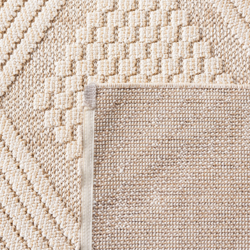 Tapis géométrique tissé à la machine en polypropylène crème / ivoire Deveah, Rectangle 5 pi 3 po x 7 pi 6 po
