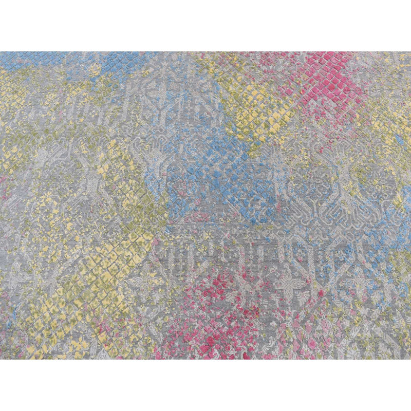 Tapis unique nouvel âge 8 pi x 10 pi Jodiann en bleu / jaune / rose / gris