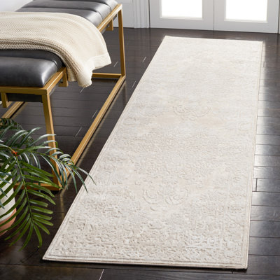 Calidia Oriental Creme/Ivory Area Rug