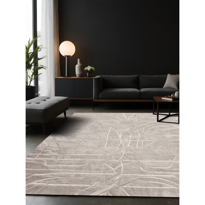 Tapis gris soyeux et moelleux