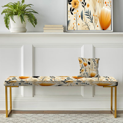 Banc en tissu beige et orange à motif de fleurs beiges et oranges