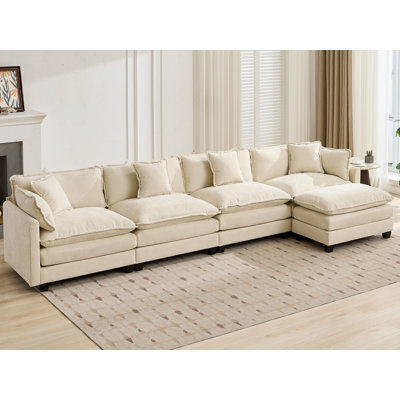 Canapé modulaire en L surdimensionné avec repose-pieds Schmucker