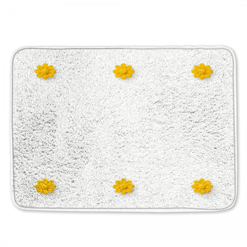 Tapis de bain jaune à motif floral, L 24 po x L 17 po