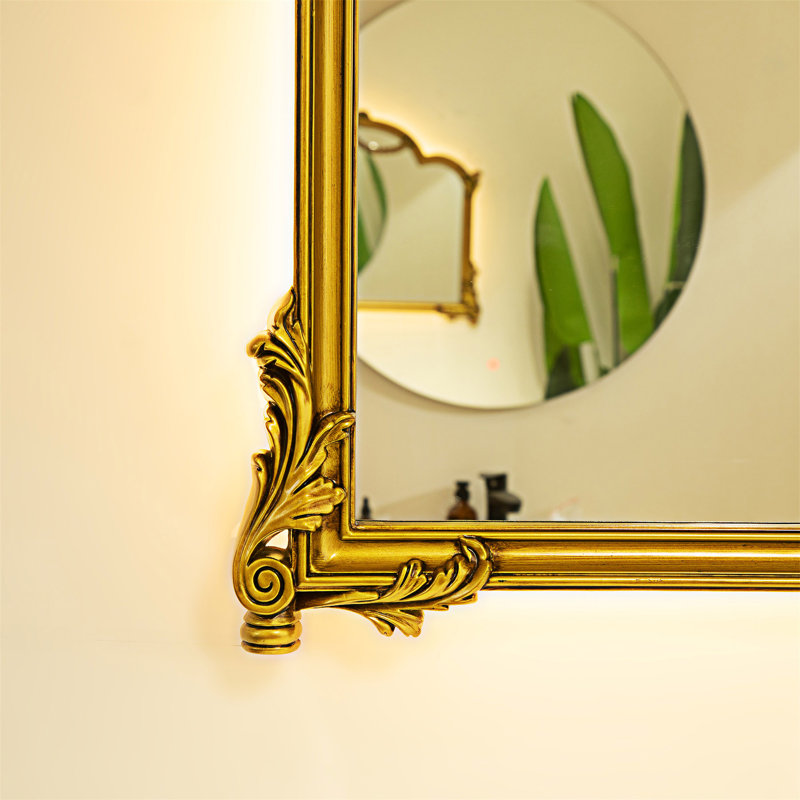 Miroir en polyuréthane avec cadre doré