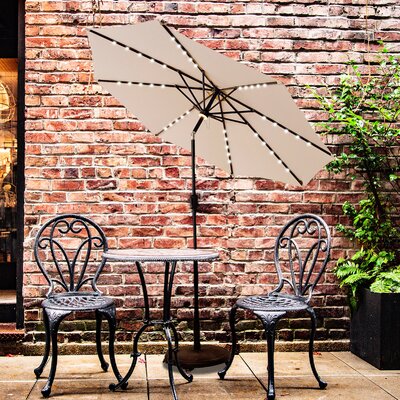 Cather 11 Ft Outdoor Patio And Table Umbrella With Solar LED Lights And Tilt -  Arlmont & Co., F6A7FDCCD9674C379B4B626762D8F187