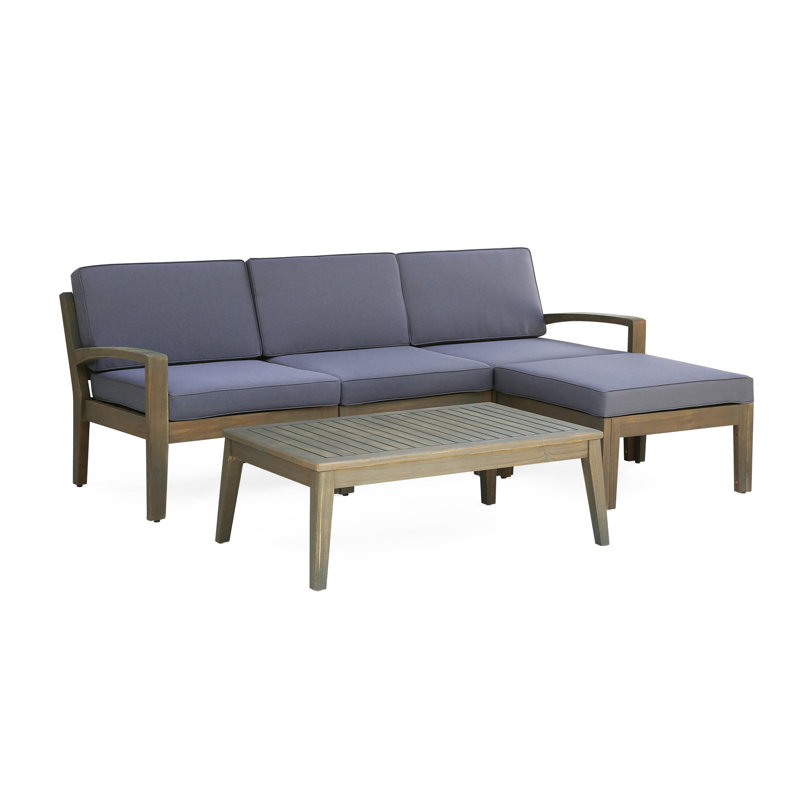 Canapé modulaire en bois pour l'extérieur en forme de L avec coussins
