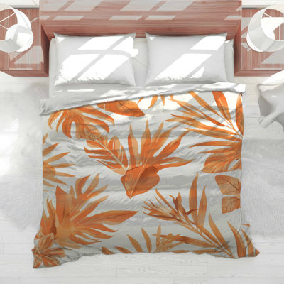 Édredon orange à feuilles tropicales