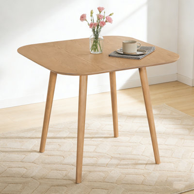Table de salle à manger carrée avec quatre pieds robustes