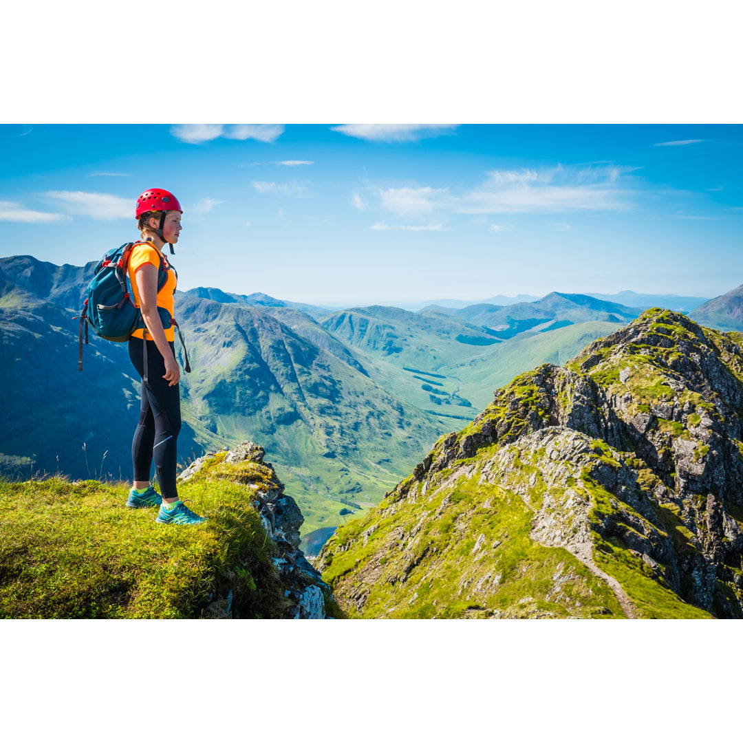 Frau Kletterer auf Bergkamm von FotoVoyager - Ohne Rahmen auf Leinwand drucken