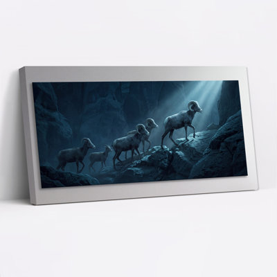 Tableau sur toile représentant un troupeau de mouflons d'Amérique bleu foncé marchant sur les parois rocheuses d'un canyon