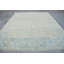 Élégant tapis tissé à la main à motif floral bleu doux et beige pour une décoration d'inspiration rétro