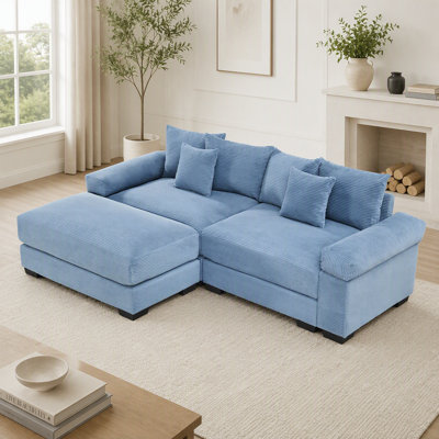 Canapé d'angle Cloud surdimensionné en forme de L avec pouf, revêtement en velours côtelé doux, assises profondes, design ergonomique, 6 coussins, montage facile, idéal pour les salons et les espaces de détente.