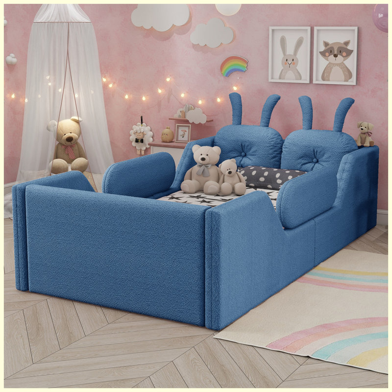 Lit plateforme simple tapissier bleu pour enfants avec coussin en lapin et rails latéraux amovibles