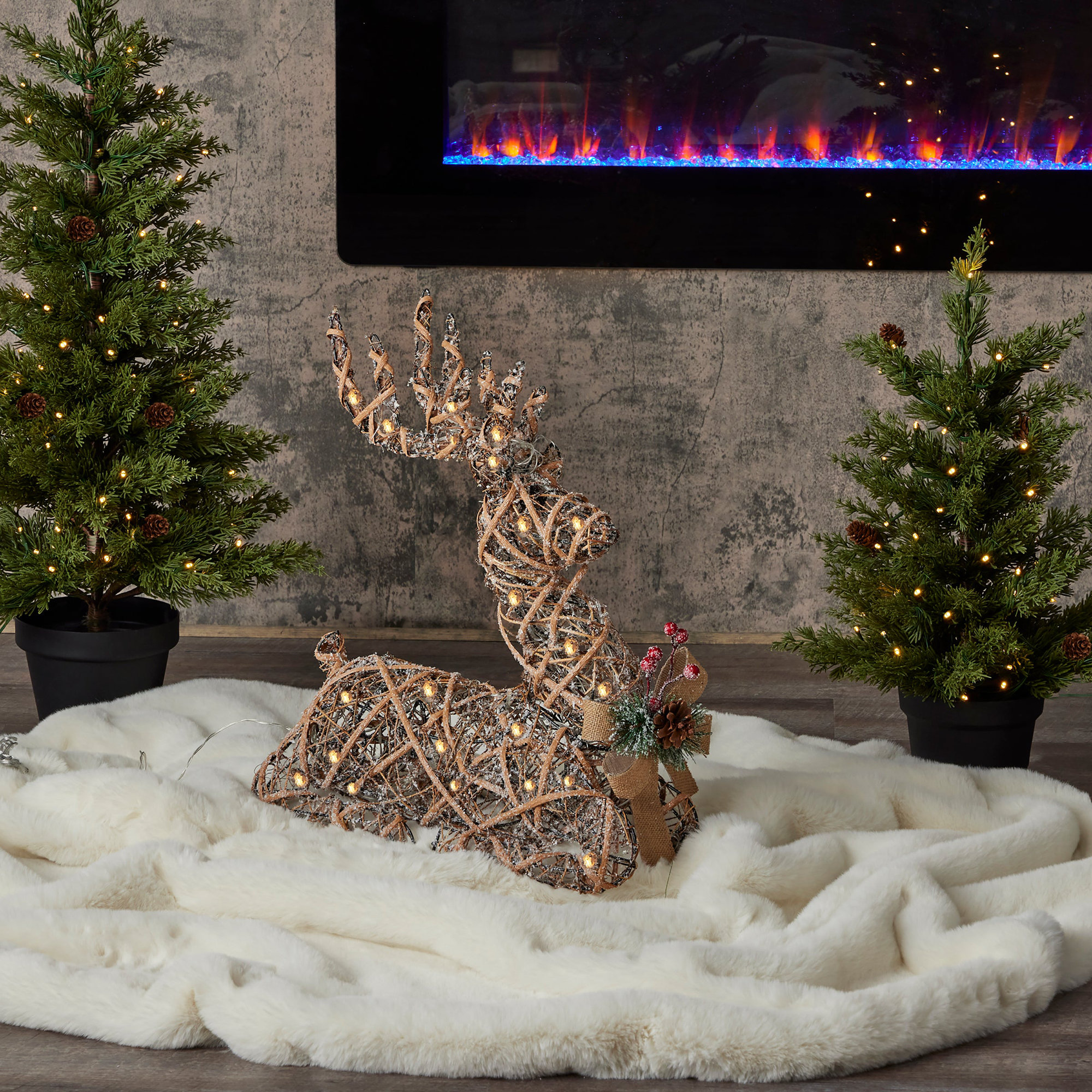 Natural Rattan Sitting Reindeer, Pre-Lit with 50 Warm White LED Lights, Plug In, 31.49"H x 9.44"W x 32.67"D