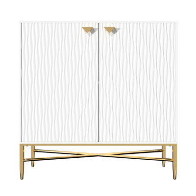 Armoire blanche à 2 portes avec poignées au design unique et pieds en X effilés. Peut supporter jusqu'à 120 lb Convient aux tablettes réglables à pieds fuselés dorés ultra brillants. Assemblage facile et rapide