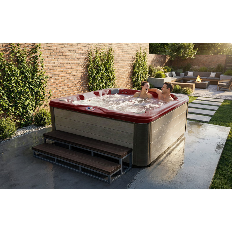 American Spas 7-Person 56-Jet Premium Bench Spa Standard Hot Tub With Sound System And LED Waterfall, Silver Oak, Dark Cherry