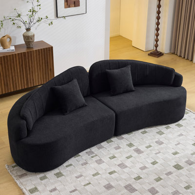Curved Four-Seat Fully Compressed Sofa With Removable Backrest, Long-Term Structural Integrity And Space-Saving Retro Design For Small Living Areas.