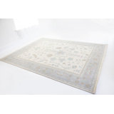 Ina Hand Knotted Wool Floral Area Rug