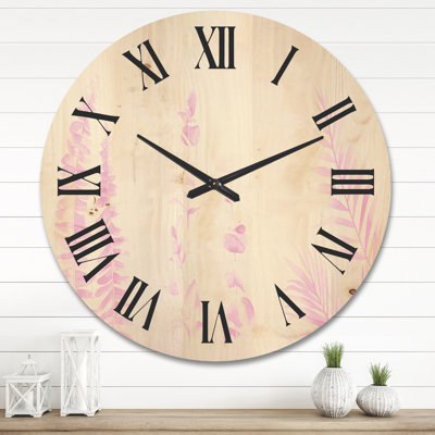 Horloge murale en bois rosé roseucalyptus et branches de palmier