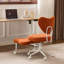 Chaise de bureau ergonomique orange, tissu et métal, idéale pour la méditation